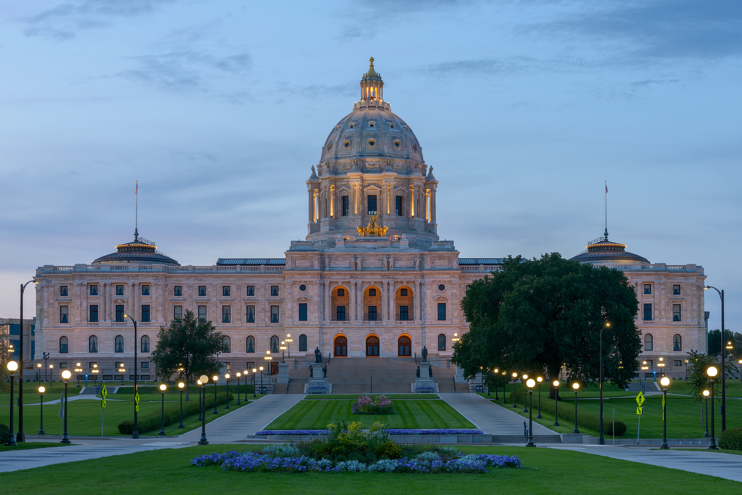 Facade of Minnesota Capitol Building with lights turned on